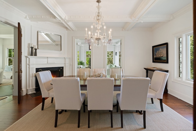 31 Contentment Island Rd, Darien, CT 06820 - dining area featuring coffered ceiling, wood finished floors, beamed ceiling, a chandelier, and a warm lit fireplace