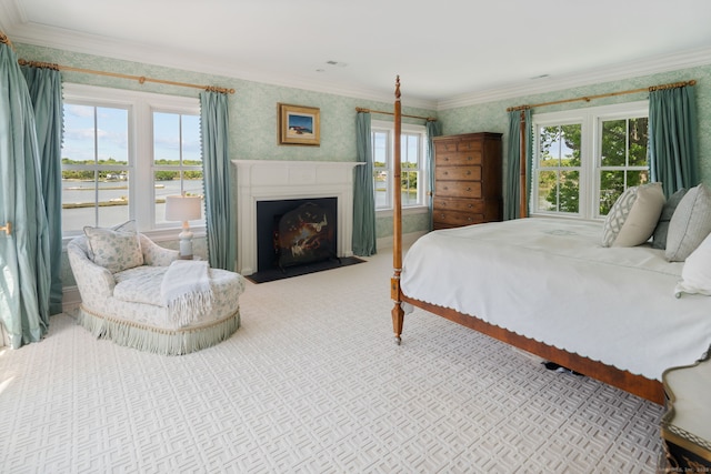 31 Contentment Island Rd, Darien, CT 06820 - carpeted bedroom with wallpapered walls, a fireplace with flush hearth, ornamental molding, and a water view