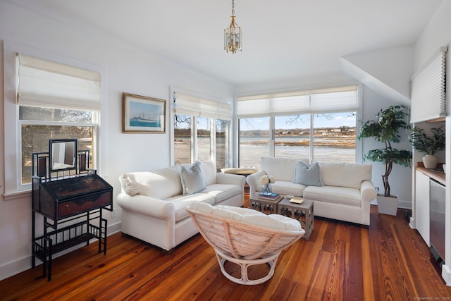 31 Contentment Island Rd, Darien, CT 06820 - living area with dark wood-style floors and baseboards