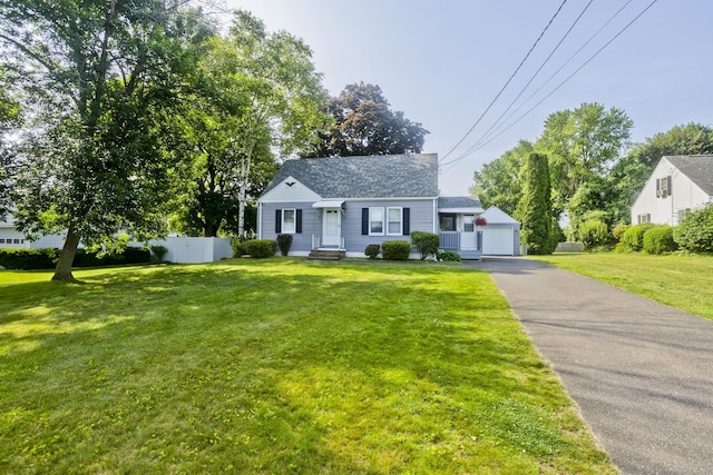 33 Old King St, Enfield, CT 06082 - view of front of home with a garage and roof with shingles