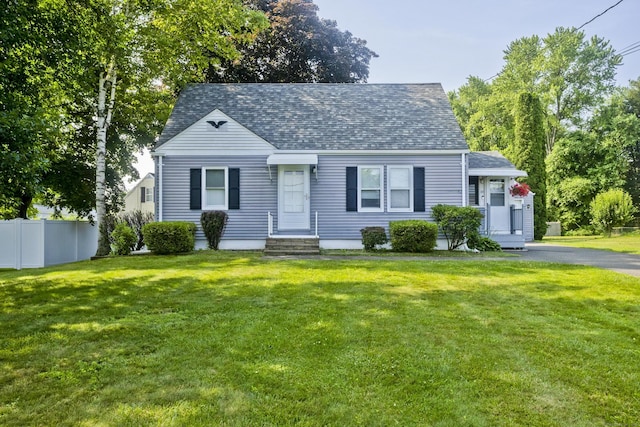 33 Old King St, Enfield, CT 06082 - new england style home featuring roof with shingles
