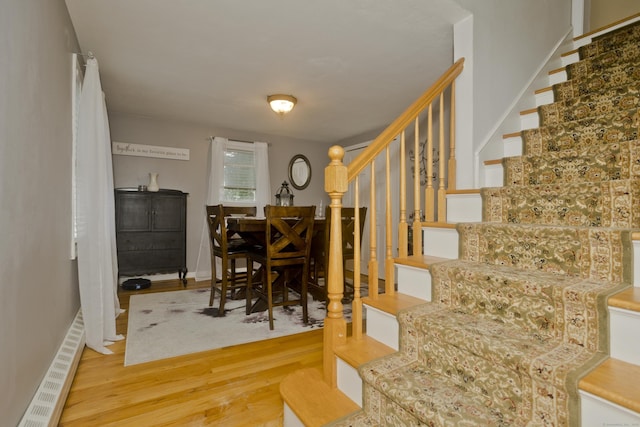 33 Old King St, Enfield, CT 06082 - staircase with wood finished floors and baseboards