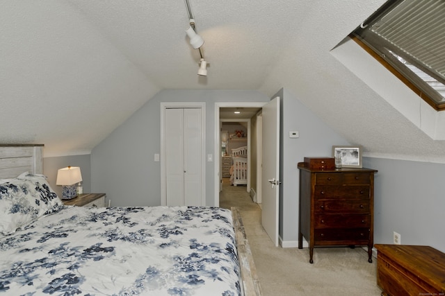 33 Old King St, Enfield, CT 06082 - bedroom with light carpet, lofted ceiling, a textured ceiling, rail lighting, and ceiling fan