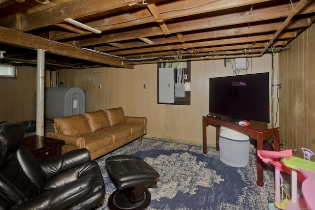 33 Old King St, Enfield, CT 06082 - living area with heating fuel, electric panel, and wooden walls
