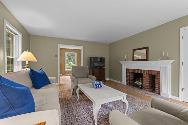 2 Applewood Cmn, East Lyme, CT 06333 - living area featuring wood finished floors and a fireplace