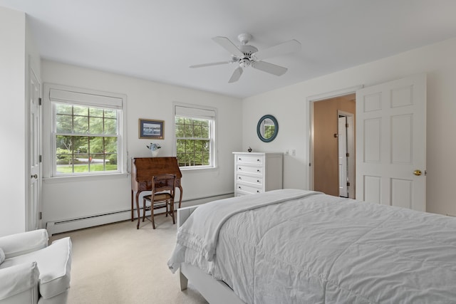 2 Applewood Cmn, East Lyme, CT 06333 - bedroom featuring light carpet, baseboard heating, and a ceiling fan