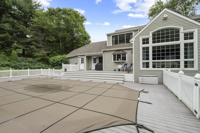 2 Applewood Cmn, East Lyme, CT 06333 - rear view of house featuring a wooden deck and roof with shingles