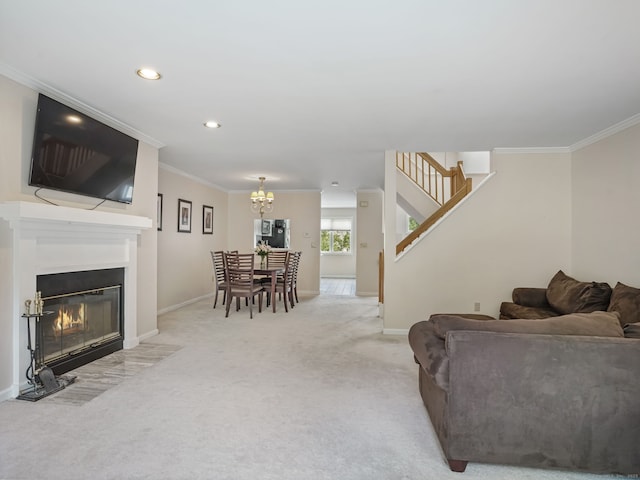 11 Boulevard Dr Unit 10-44, Danbury, CT 06810 - carpeted living area with crown molding, stairway, a chandelier, a fireplace with flush hearth, and recessed lighting