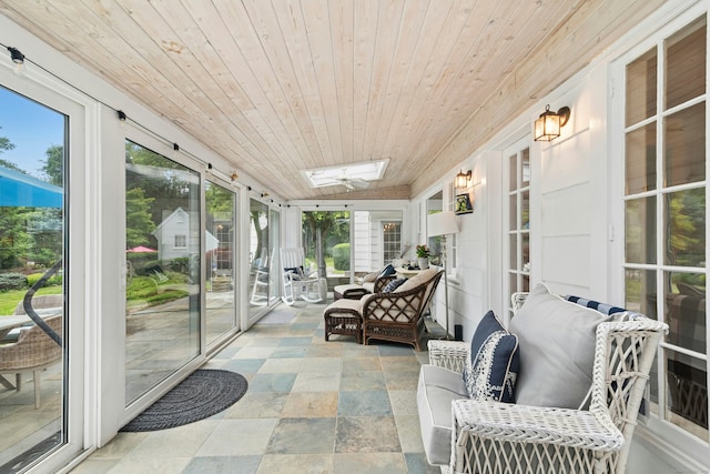 39 Campbell Rd, Fairfield, CT 06824 - sunroom featuring ceiling fan and a skylight