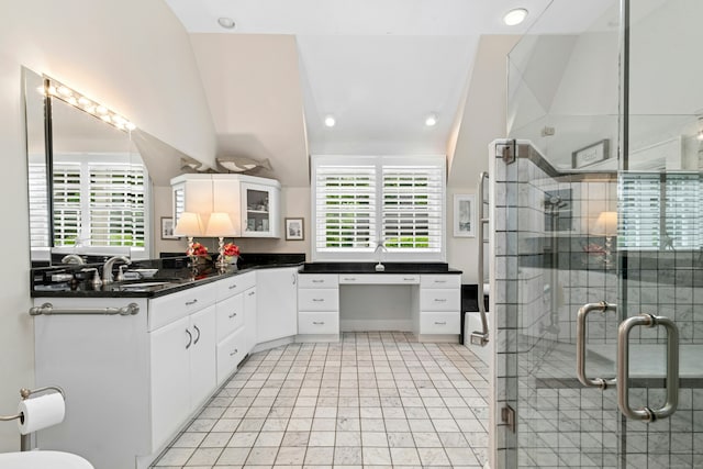 39 Campbell Rd, Fairfield, CT 06824 - full bathroom featuring vanity, a shower stall, lofted ceiling, recessed lighting, and tile patterned flooring