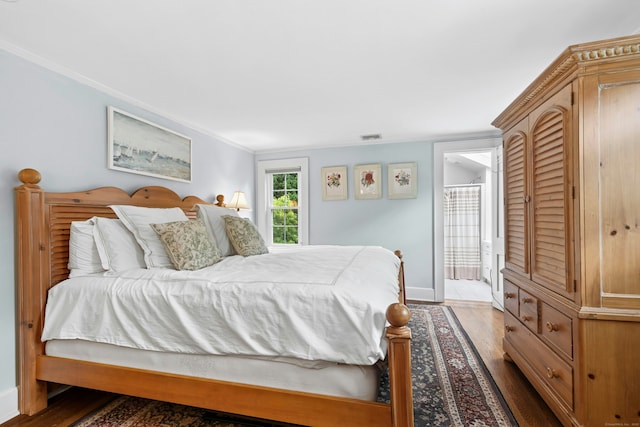 39 Campbell Rd, Fairfield, CT 06824 - bedroom with wood finished floors, crown molding, and connected bathroom