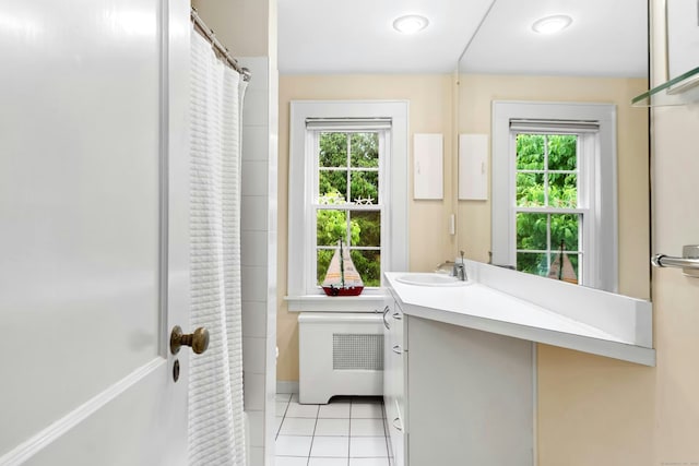 39 Campbell Rd, Fairfield, CT 06824 - bathroom featuring radiator heating unit, vanity, tile patterned floors, and a shower with curtain