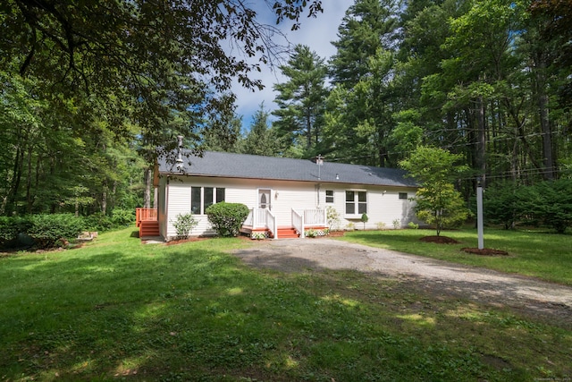63 Rose Haven Rd, Somers, CT 06071 - rear view of house featuring a lawn