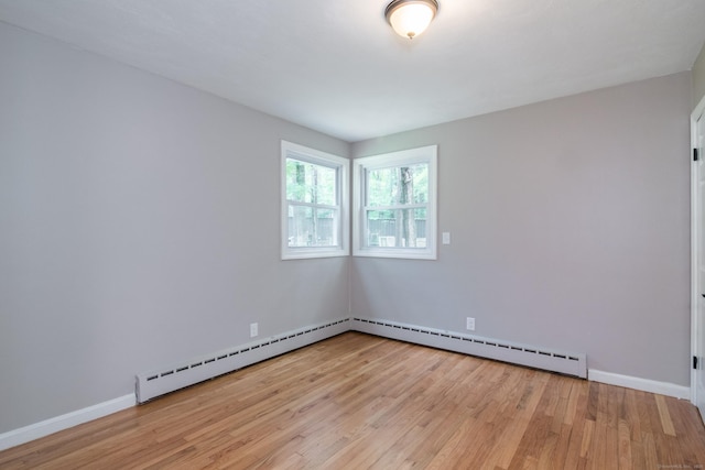 63 Rose Haven Rd, Somers, CT 06071 - spare room with a baseboard radiator and light wood finished floors