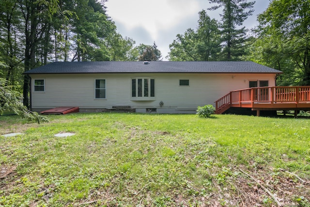 63 Rose Haven Rd, Somers, CT 06071 - back of property with a deck and a lawn