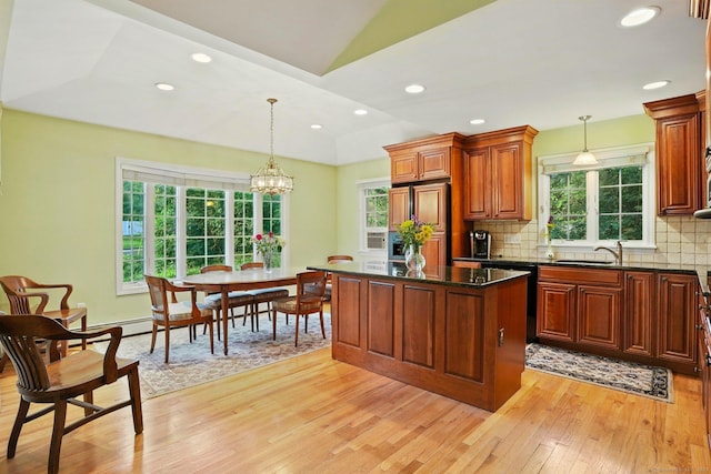 41 White Birch Dr, Trumbull, CT 06611 - kitchen with light wood-style floors, a center island, decorative backsplash, pendant lighting, and a chandelier