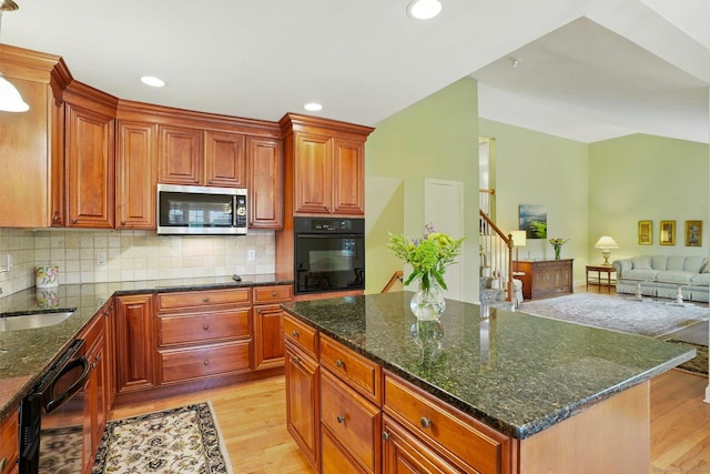 41 White Birch Dr, Trumbull, CT 06611 - kitchen with black appliances, light wood finished floors, tasteful backsplash, and recessed lighting