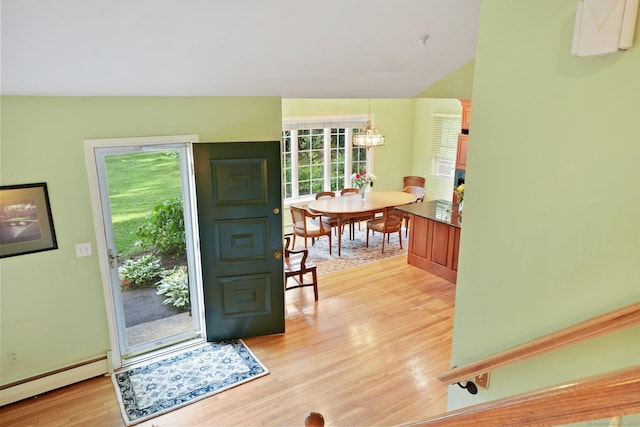 41 White Birch Dr, Trumbull, CT 06611 - entryway with a baseboard heating unit, light wood finished floors, and a chandelier