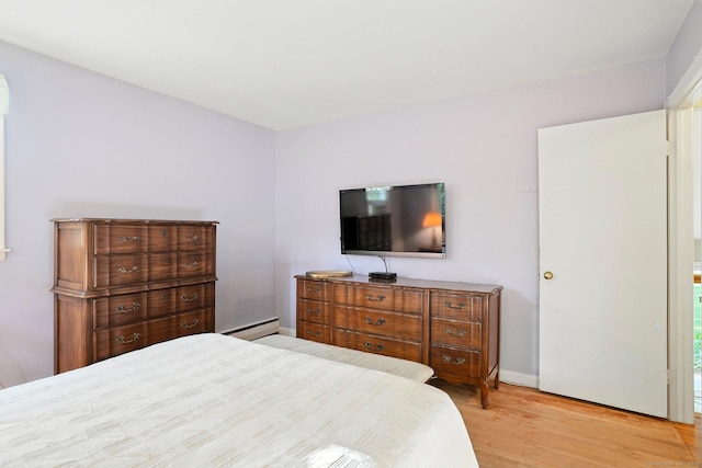 41 White Birch Dr, Trumbull, CT 06611 - bedroom featuring a baseboard radiator and light wood-style flooring