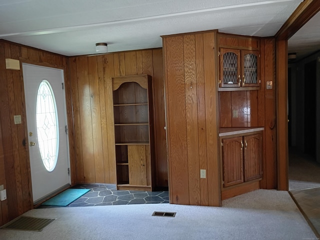 65 Woodland Park, Shelton, CT 06484 - foyer featuring wooden walls and carpet flooring