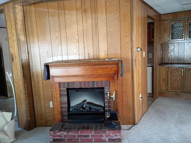 65 Woodland Park, Shelton, CT 06484 - detailed view of carpet flooring, wood walls, and a fireplace