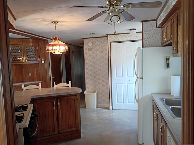 65 Woodland Park, Shelton, CT 06484 - kitchen featuring white appliances, tile patterned floors, a ceiling fan, pendant lighting, and wallpapered walls