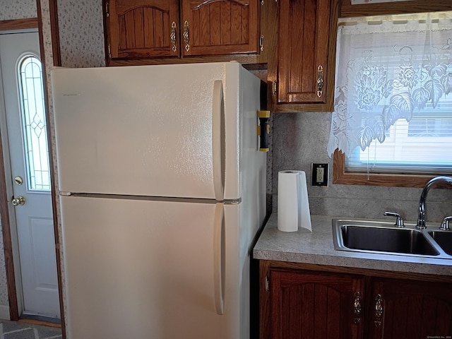 65 Woodland Park, Shelton, CT 06484 - kitchen featuring freestanding refrigerator and brown cabinetry