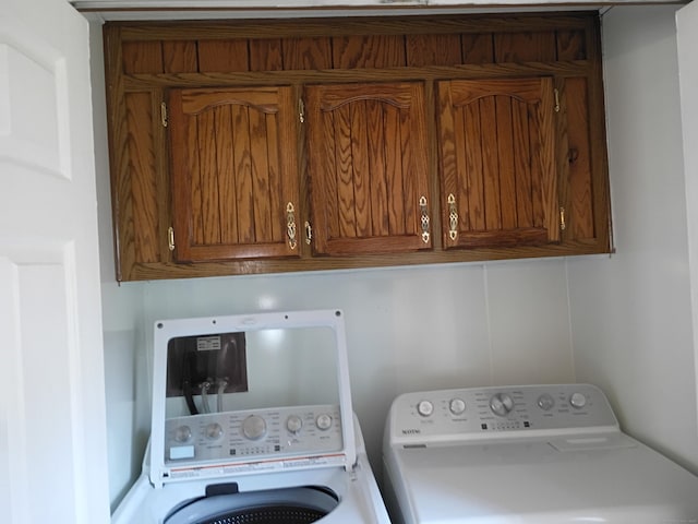 65 Woodland Park, Shelton, CT 06484 - laundry room featuring cabinet space and independent washer and dryer