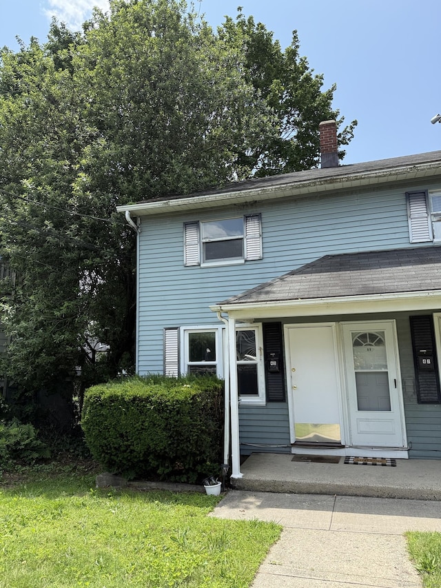 49 Soundview Ave Unit 49, Stamford, CT 06606 - traditional-style house featuring a chimney