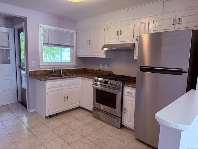49 Soundview Ave Unit 49, Stamford, CT 06606 - kitchen with stainless steel appliances, under cabinet range hood, white cabinetry, and light tile patterned flooring