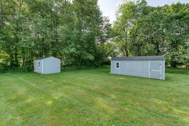 28 Clementel Dr, Durham, CT 06422 - view of grassy yard featuring a storage shed and view of scattered trees