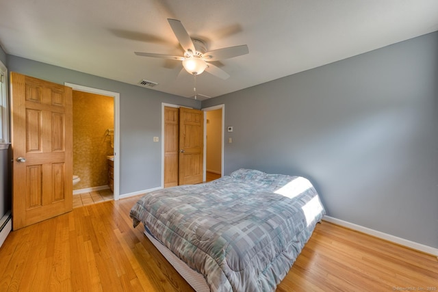 28 Clementel Dr, Durham, CT 06422 - bedroom with light wood-type flooring, ensuite bathroom, and a ceiling fan