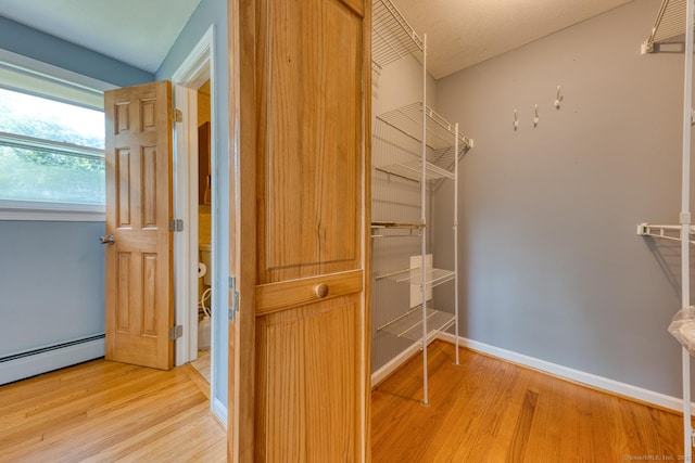 28 Clementel Dr, Durham, CT 06422 - spacious closet with light wood-type flooring and baseboard heating