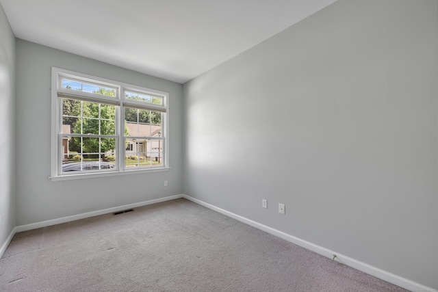 71 Lavender Ln Unit 71, South Windsor, CT 06074 - spare room with baseboards and carpet flooring