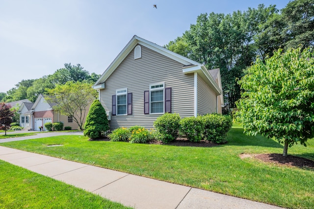 71 Lavender Ln Unit 71, South Windsor, CT 06074 - view of side of home featuring a yard