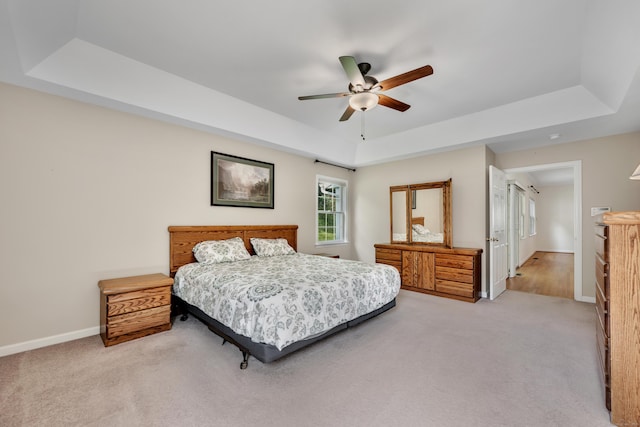 71 Lavender Ln Unit 71, South Windsor, CT 06074 - bedroom with a tray ceiling, light colored carpet, and ceiling fan