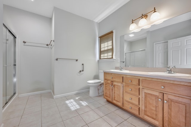 71 Lavender Ln Unit 71, South Windsor, CT 06074 - full bathroom featuring double vanity, an enclosed shower, and tile patterned floors