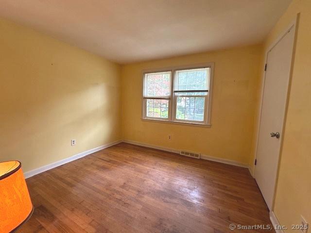 15 Bargate Rd, Clinton, CT 06413 - unfurnished room with wood finished floors and baseboards