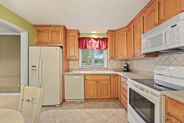 100 Chandler, Windsor, CT 06095 - kitchen with white appliances, light countertops, tasteful backsplash, and light tile patterned floors