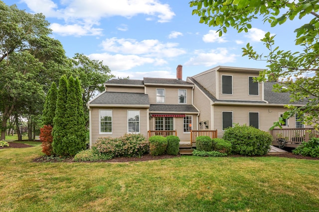100 Chandler, Windsor, CT 06095 - rear view of house featuring a deck, a yard, a chimney, and a shingled roof