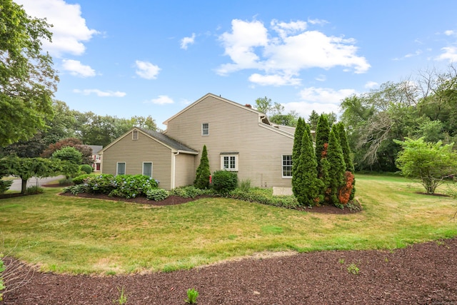 100 Chandler, Windsor, CT 06095 - view of side of property with a lawn