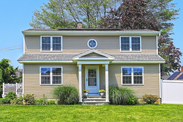 30 Wilcox Rd, Milford, CT 06460 - view of front of home with entry steps, a shingled roof, and a chimney