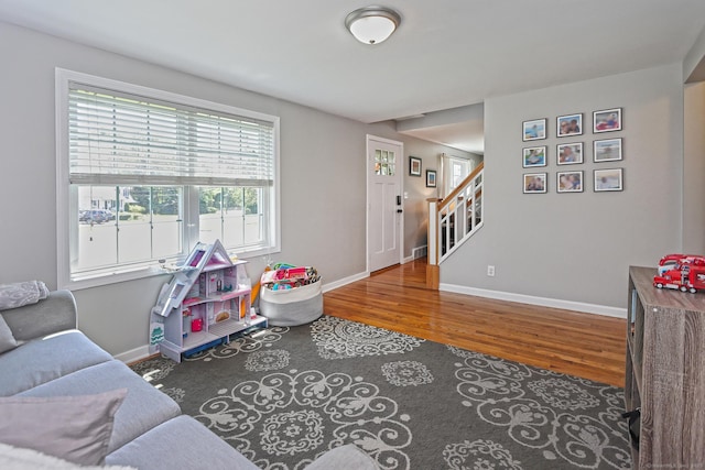30 Wilcox Rd, Milford, CT 06460 - living area with wood finished floors and stairway