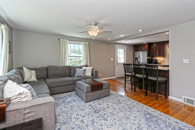 30 Wilcox Rd, Milford, CT 06460 - living area featuring healthy amount of natural light, wood finished floors, a ceiling fan, and recessed lighting