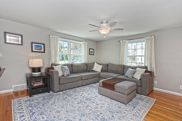 30 Wilcox Rd, Milford, CT 06460 - living area featuring plenty of natural light, ceiling fan, and wood finished floors