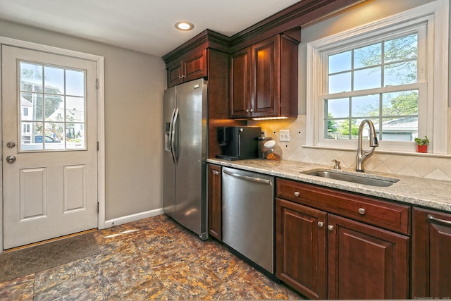 30 Wilcox Rd, Milford, CT 06460 - kitchen with appliances with stainless steel finishes, backsplash, light stone countertops, and recessed lighting