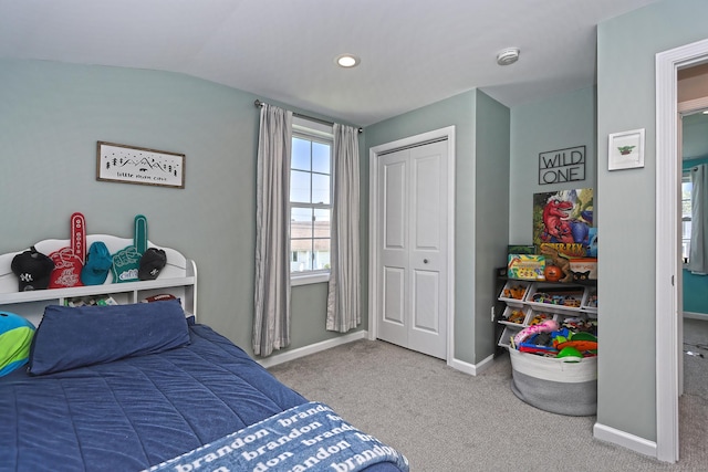 30 Wilcox Rd, Milford, CT 06460 - bedroom with carpet, a closet, vaulted ceiling, and recessed lighting