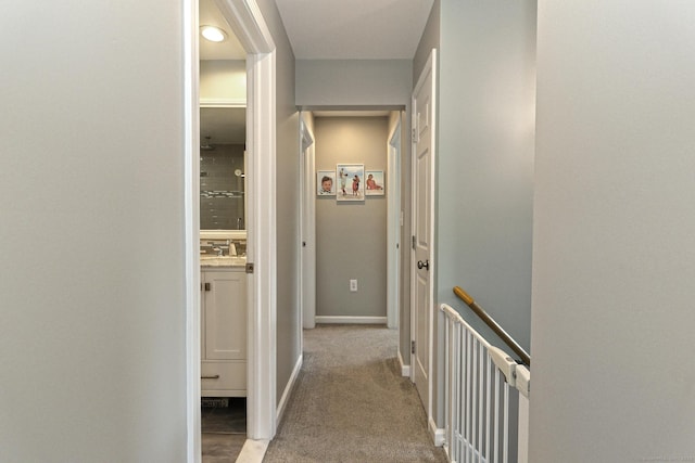 30 Wilcox Rd, Milford, CT 06460 - hall featuring an upstairs landing and light colored carpet