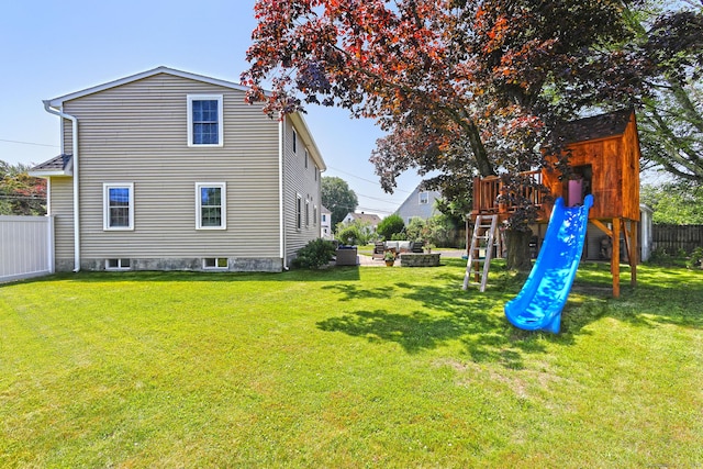 30 Wilcox Rd, Milford, CT 06460 - back of house featuring a playground
