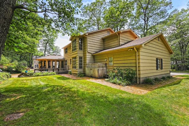 55 Gate Way, Hamden, CT 06518 - back of property with a deck, a yard, and a shingled roof